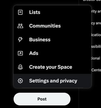 Screenshot of the X navigation menu with the “More” dropdown open, displaying options including Lists, Communities, Business, Ads, Create your Space, and Settings and privacy.